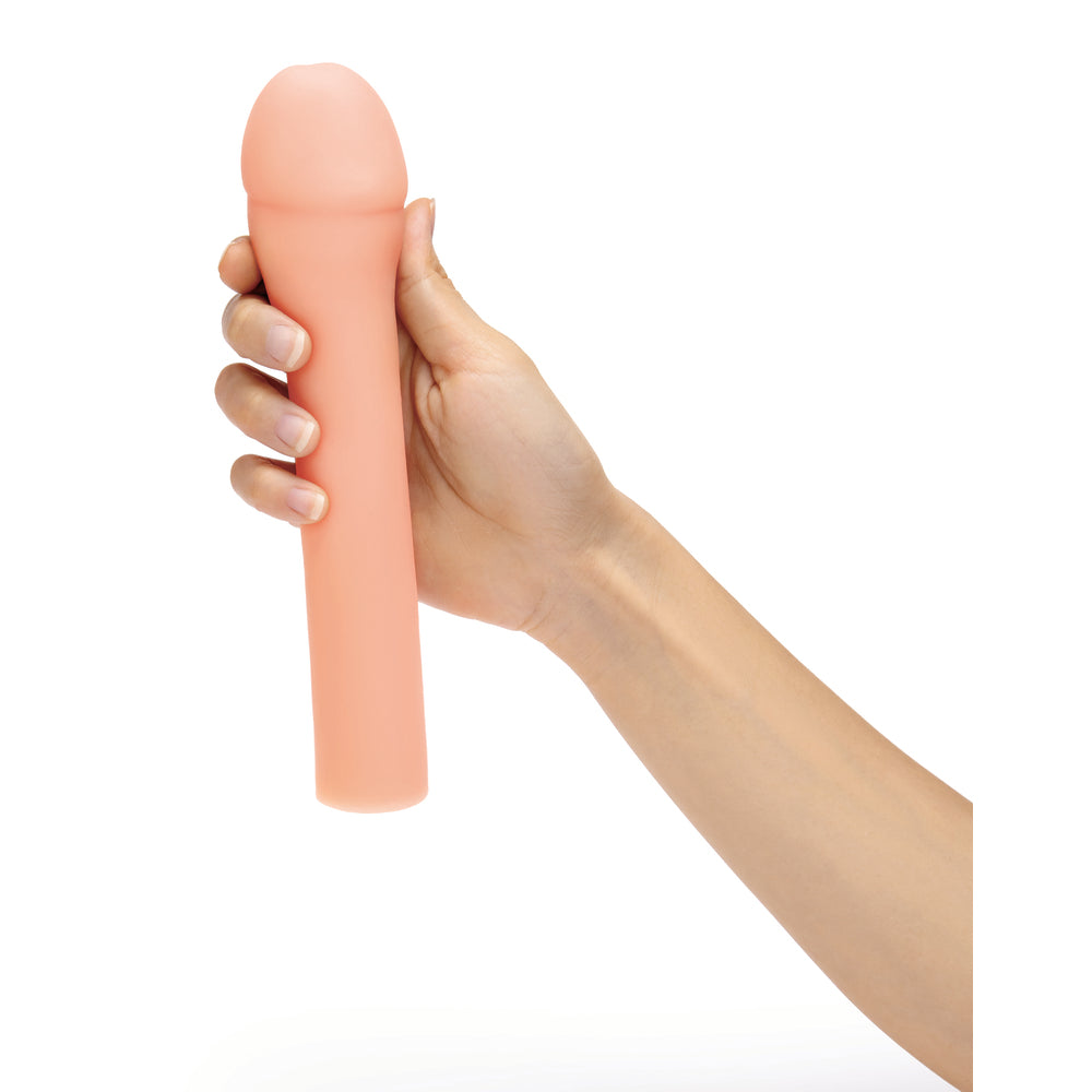 Hand holding Size Up 3-inch penis extender