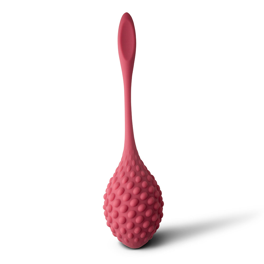 Pink silicone kegel exerciser with textured bulb.