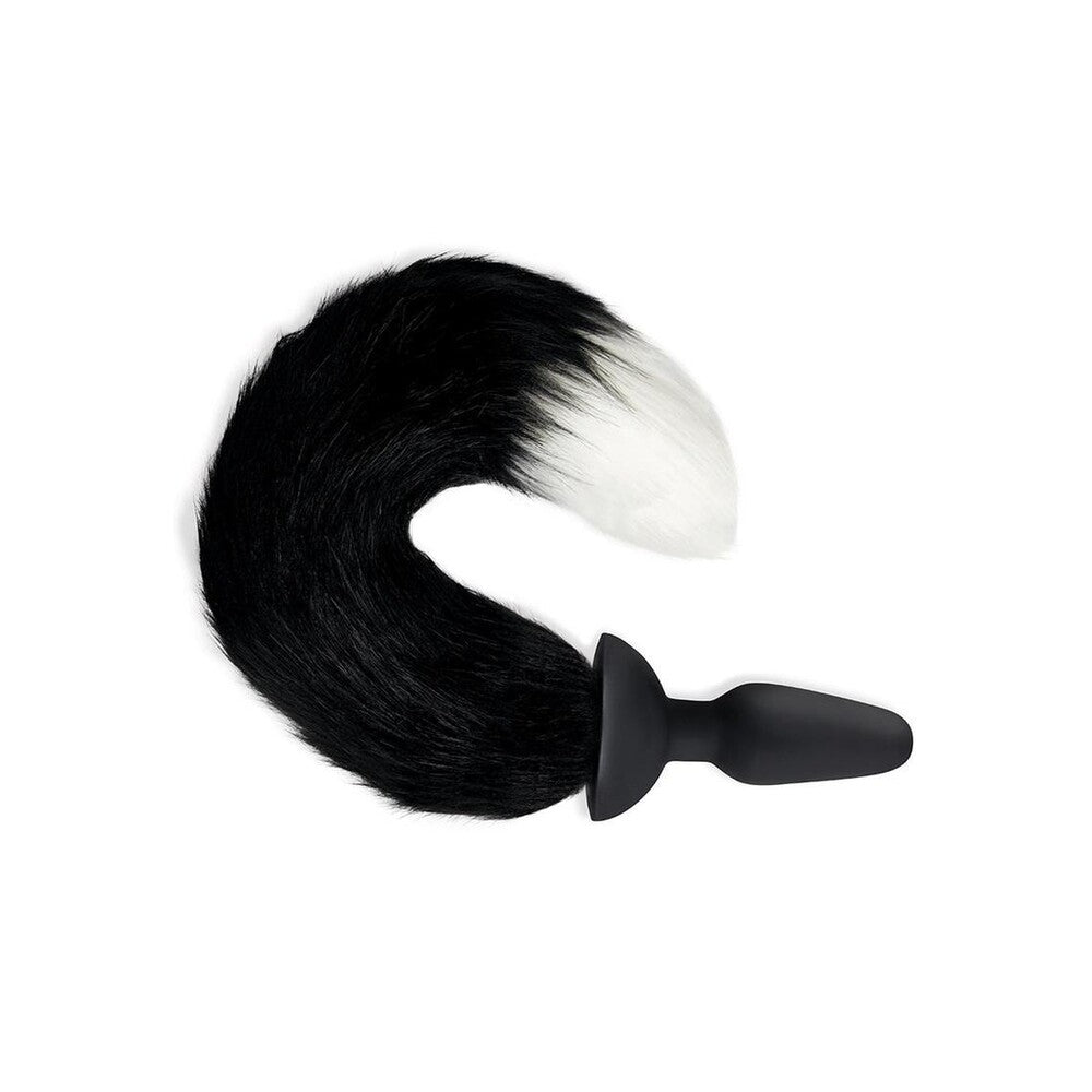 Furry Tales black and white vibrating butt plug with a fox tail.
