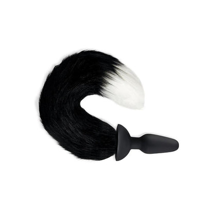 Furry Tales black and white vibrating butt plug with a fox tail.