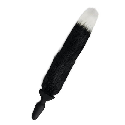 Black faux-fur butt plug with a fluffy white tip.