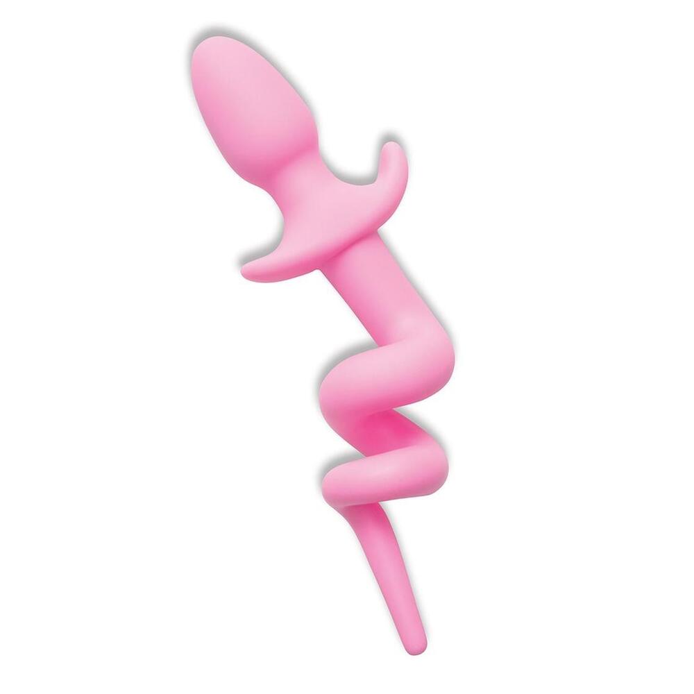 Pink silicone piggy tail butt plug.